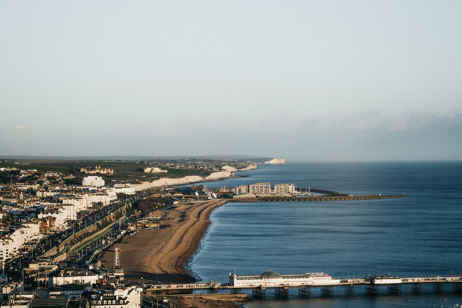 The Sussex coast from above: seafront, beach and pier.